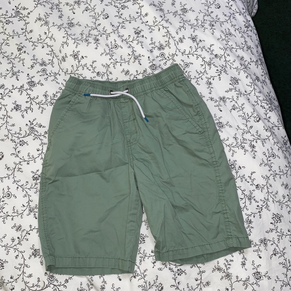 Boys pull on shorts